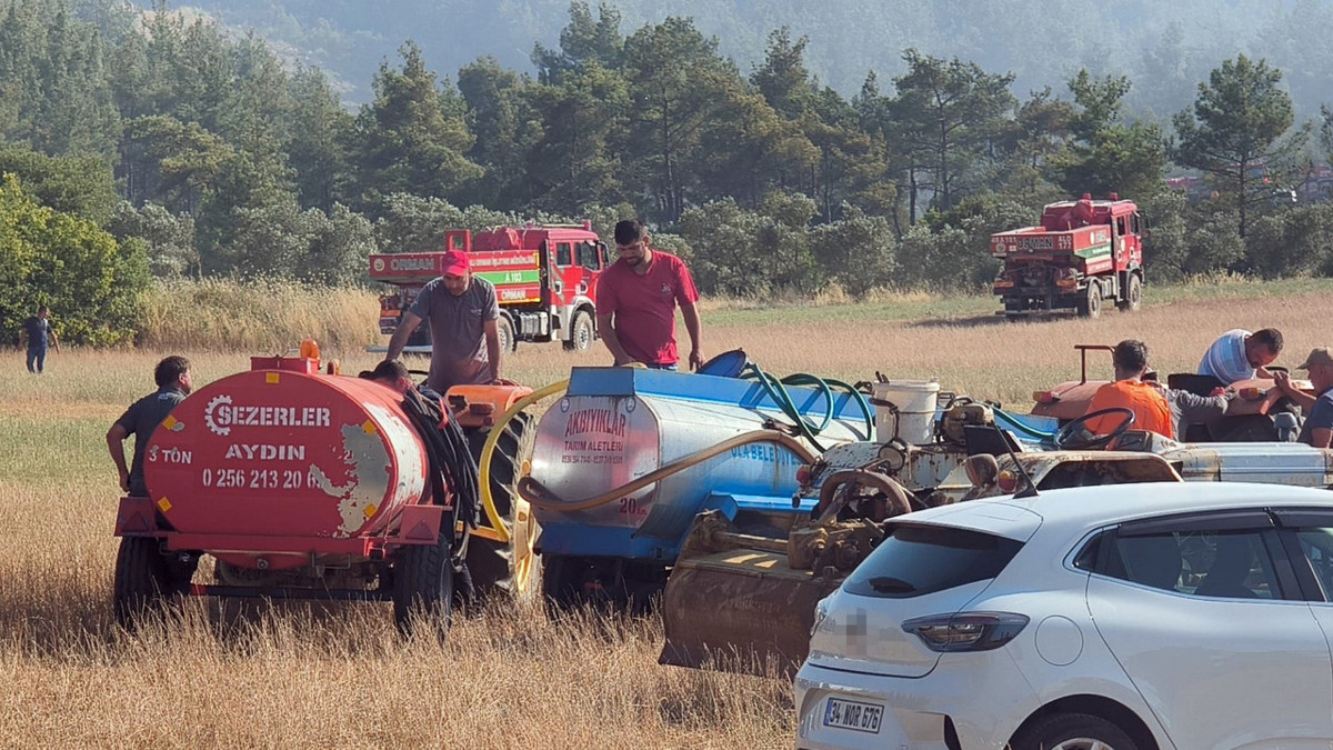 Muğla'daki yangına imece usulü müdahale! Traktörünü ve su tankerini alan yangına koştu