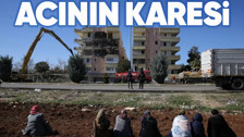 Acının karesi! Şanlıurfa'da depremde ağır hasar alan binalarının yıkımını böyle izlediler