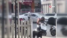 Ataşehir'de gözü dönen şahıs kamerada! Kaldırım taşıyla otomobilin camlarına vurdu