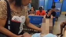 Kredi alabilmek için ölü amcasını bankaya götürdüğü anlar kameraya yansıdı: Gerçek polisin gelmesi ile ortaya çıktı