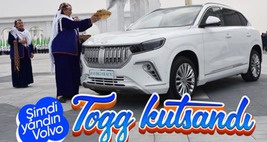 Türkmenistan'da Togg teslimatında geleneksel tören! Direksiyonuna “alaca” bağlayıp, üzerlikle tütsülediler...