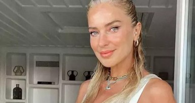 İtalya'da Nazım Akmandil ile dünyaevine giren Burcu Esmersoy İstanbul'da da düğün yaptı! Derin dekolteli gelinliği dikkat çekti