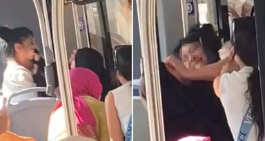 Çarşaflı anneye otobüste saldırı: Defolun bu ülkeden