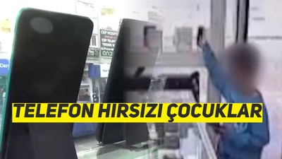 Anne-çocuk görünümlü hırsızlar telefoncu dükkanlarını mesken tuttu