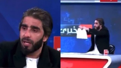Profesör canlı yayında kadınlara yönelik eğitim yasağına dikkat çekmek için diplomalarını yırttı
