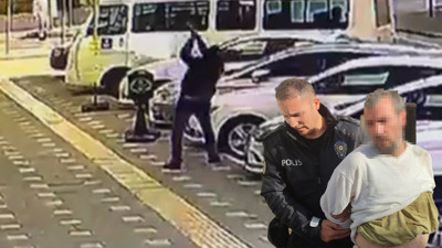 Bursa'da bir vatandaş elindeki baltayla park halindeki otomobillere saldırdı! O anlar kamerada