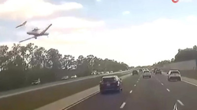 Florida'da otoyola inen uçağın duvara çarparak alev aldığı anlar ortaya çıktı