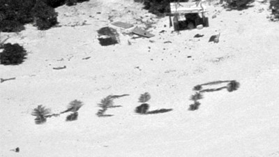 Issız adada mahsur kalanlar, kumsala "yardım" yazarak kurtuldu