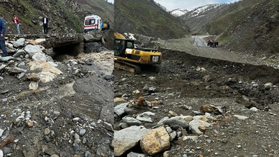 Sel felaketi köy yolunu ikiye ayırdı, ekipler hamile kadın için seferber oldu