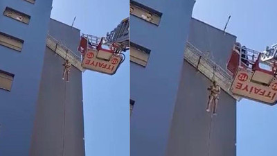 7 katlı binanın inşaatında halatın kopması sonucu iskelede asılı kaldı