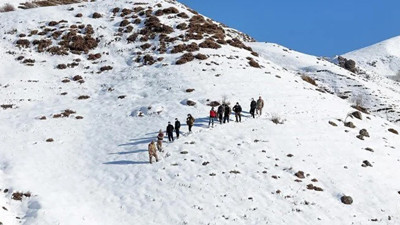 Erzurum'da insan kaçakçısını kardaki ayak izleri ele verdi