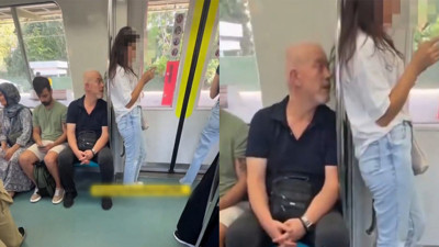Marmaray'da mide bulandıran görüntü! Saçlarını kokladı, boydan boya süzdü