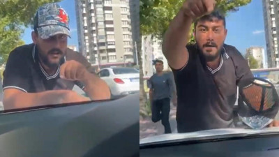 Cam silme bahanesiyle aracın kaputuna yatıp zorla para isteyen şahıs tutuklandı