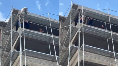 Binadan atlamak isteyen şahsı, itfaiye ekipleri ikna etti