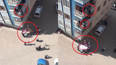 Balkondan düşme tehlikesi geçiren Down sendromlu çocuğu, komşusu kurtardı; o anlar kamerada