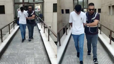Polisi gören firari, çimlere yatıp ölü taklidi yaptı