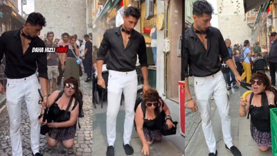 Tasma taktığı kadını sokaklarda dolaştırdı: Tutuklandılar