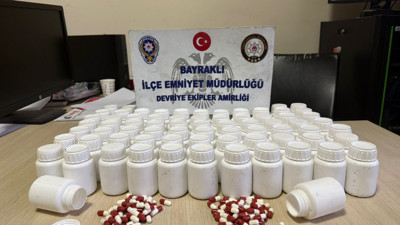 İzmir'de mezarlıkta poşet içerisinden binlerce uyuşturucu hap çıktı