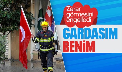 Azerbaycanlı itfaiyeciden anlamlı hareket! Yangında Türk bayrağının zarar görmesini engelledi