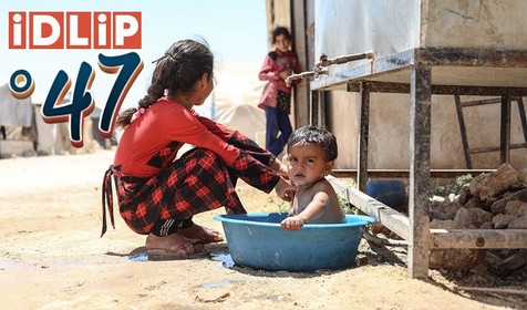 İdlib yanıyor: 47 derece ile ilginç mücadele! Çocuklarının hayatta kalması için yeni taktik geliştirdi