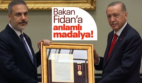 Son Dakika: Cumhurbaşkanı Erdoğan'dan Dışişleri Bakanı Hakan Fidan'a üstün hizmet madalyası