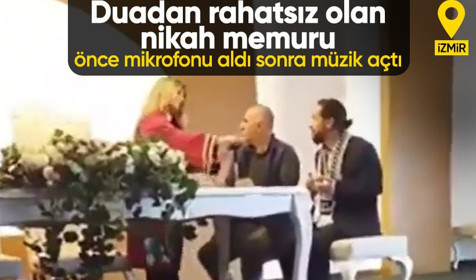 İzmir'de dua edilmesinden rahatsız olan nikah memuru önce mikrofonu aldı, sonra müzik açtı