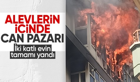 Yangında mahsur kalan anne ile çocukları, komşularının yardımıyla kurtarıldı