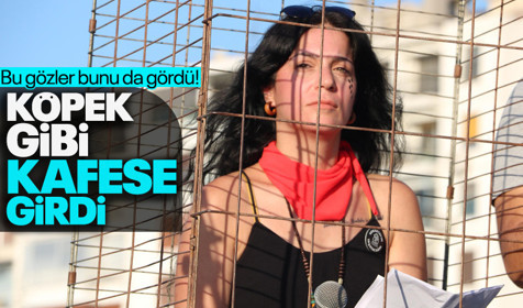 Hayvan hakları savunucusu açıklamasını demir kafeste yaptı