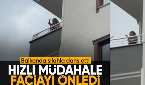 Balkona çıkarak dans eden kadın etrafa ateş etmeye çalıştı
