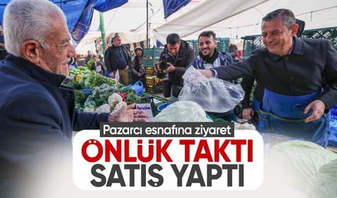 Özgür Özel'den pazarcı esnafına ziyaret: Önlük taktı, satış yaptı