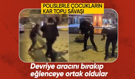 Çocuklar, devriye gezen polis ekiplerini kartopu yağmuruna tuttu