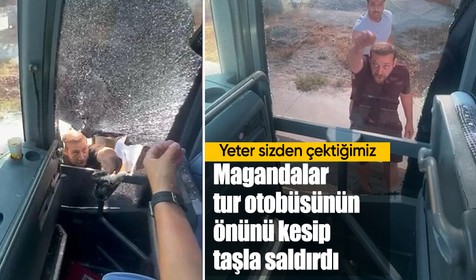 Turistlerin taşındığı otobüsün önünü kesip taşla saldırdılar