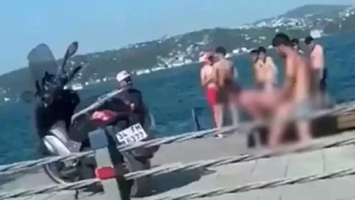 Bebek sahilinde ulu orta cinsel ilişkiye girmişlerdi! O kadın hakkında yakalama kararı çıkartıldı - Resim: 1