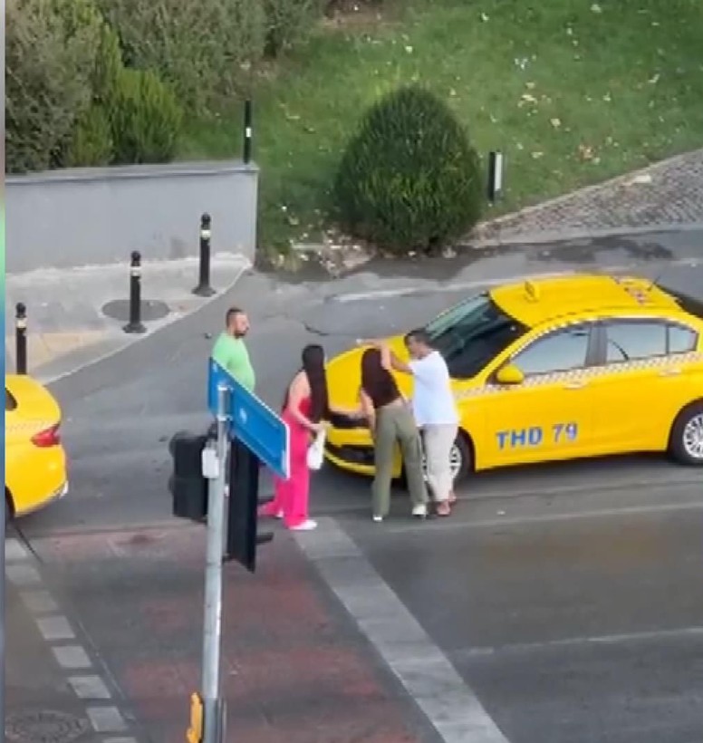 Beyoğlu'nda taksici ile kadınların kavgası kamerada - Resim: 6