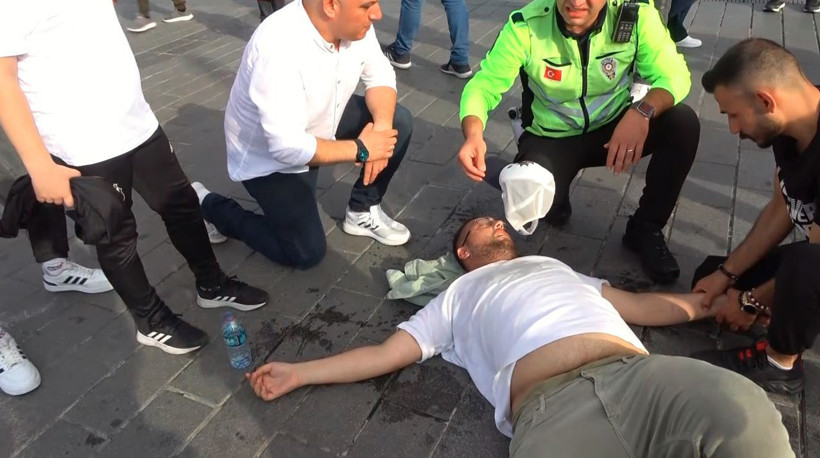 Polis vicdanı: Bayılan vatandaşın yanından ayrılmadı - Resim : 1