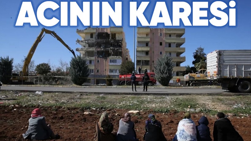 Acının karesi! Şanlıurfa'da depremde ağır hasar alan binalarının yıkımını böyle izlediler
