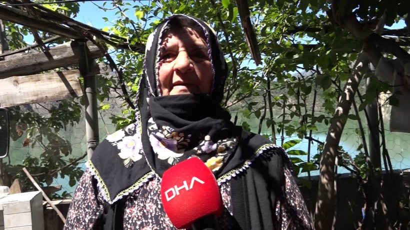 Baraj suyu köyü ikiye böldü; taşınmayan evlerde göl manzarası - Resim: 11