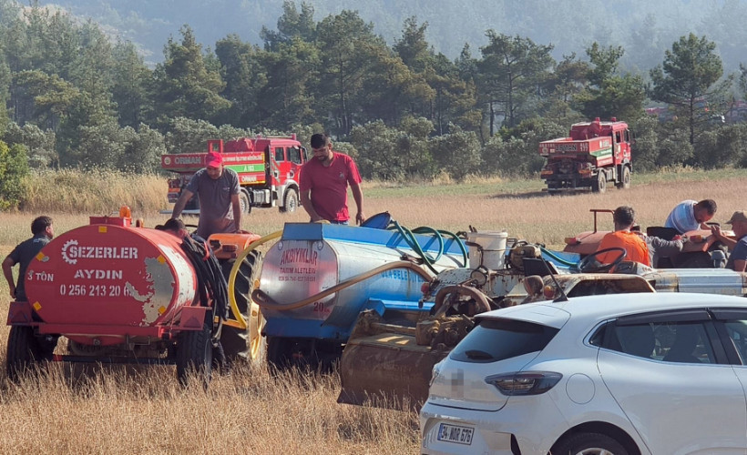 Muğla'daki yangına imece usulü müdahale! Traktörünü ve su tankerini alan yangına koştu
