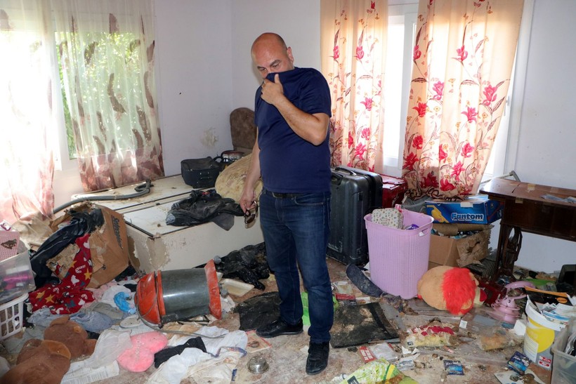 Kiracının çıktığı evden çıkanlar mide bulandırdı! Virane evden onlarca kedi ölüsü çıktı - Resim: 15